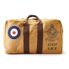 Load image into Gallery viewer, Beige RCAF duffel bag with brown straps and vintage-style graphics on a white background