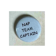 Load image into Gallery viewer, Pin on 1 1/4" button with " nap team captain".