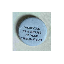 Load image into Gallery viewer, Pin on 1 1/4" button with " worrying is a misuse of your imagination".