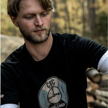 Load image into Gallery viewer, Showing a male person wearing the t-shirt.