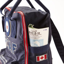 Load image into Gallery viewer, Close up of bag showing side pockets for storage.