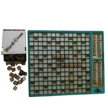Load image into Gallery viewer, Wooden board game outline in blue with letter tiles.