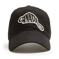 Dark blue cotton twill ball cap with a logo Canada shaped like a beaver.