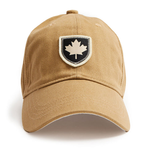 Tan ball cap made from brushed cotton with the Canada Shield logo.