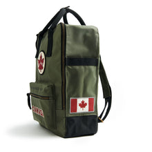 Load image into Gallery viewer, Side view showing extra pockets and Canada patch.
