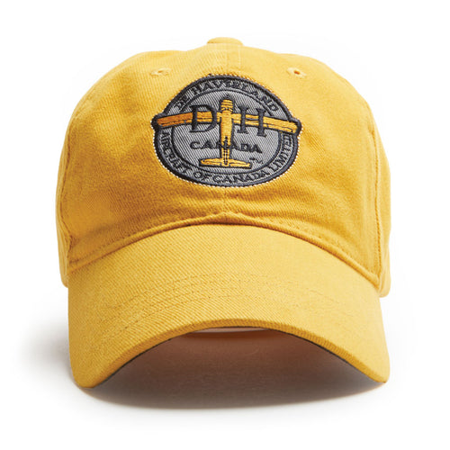 Burnt yellow, cotton twill ball cap. Applique and embroidery patch.