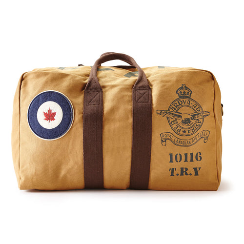 Beige RCAF duffel bag with brown straps and vintage-style graphics on a white background