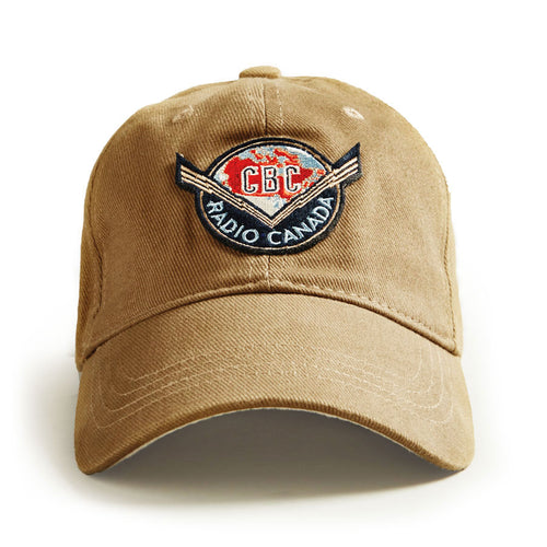 Tan CBC Radio Canada ball cap. Adjustable strap with felt applique.