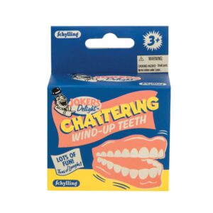 Old fashion game of chattering wind-up teeth. Made from plastic, looks like a set of dentures.