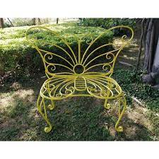 Beautiful garden Butterfly chair. Sturdy metal construction, chair is yellow in colour.