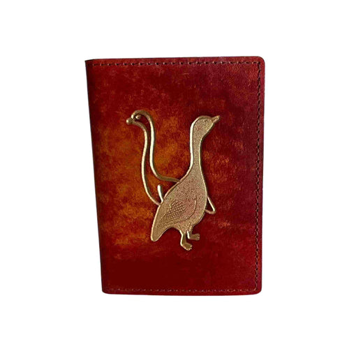 Leather card wallet with duck image.