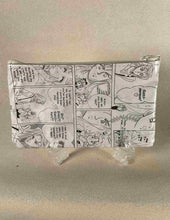 Load image into Gallery viewer, A small bag made with a comic bag.
