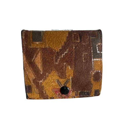 Brown multi colour leather change purse.