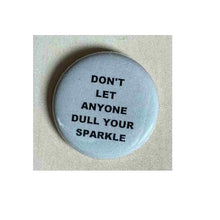 Load image into Gallery viewer, Pin on 1 1/4&quot; button with &quot; don&#39;t let anyone dull your sparkle&quot;.
