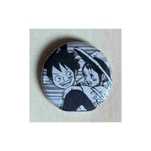 Load image into Gallery viewer, Pin on 1 1/4&quot; button with anime boy and girl from one piece.
