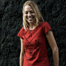 Load image into Gallery viewer, Girl wearing T-shirt with cross Canada logo.
