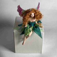 Load image into Gallery viewer, Sitting fairy with a beautiful smile, handmade porcelain.
