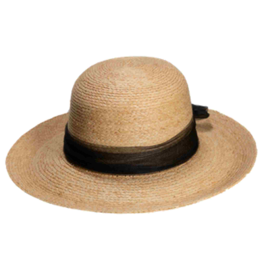 Women's summer hat made with Madagascar hand woven raffia braid with black tulle trim.