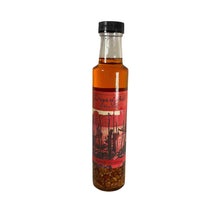 Load image into Gallery viewer, A 8 oz bottle of infused spicy olive oil.
