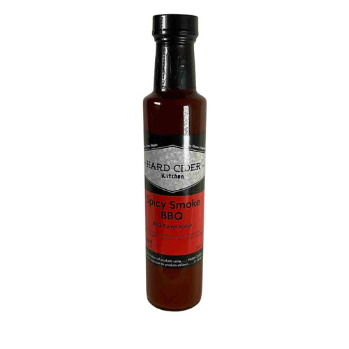 A 8 oz bottle of Spicy Smoke BBQ sauce.