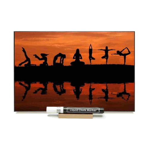 Photo chalkboard with photo of various yoga poses in the sunset.