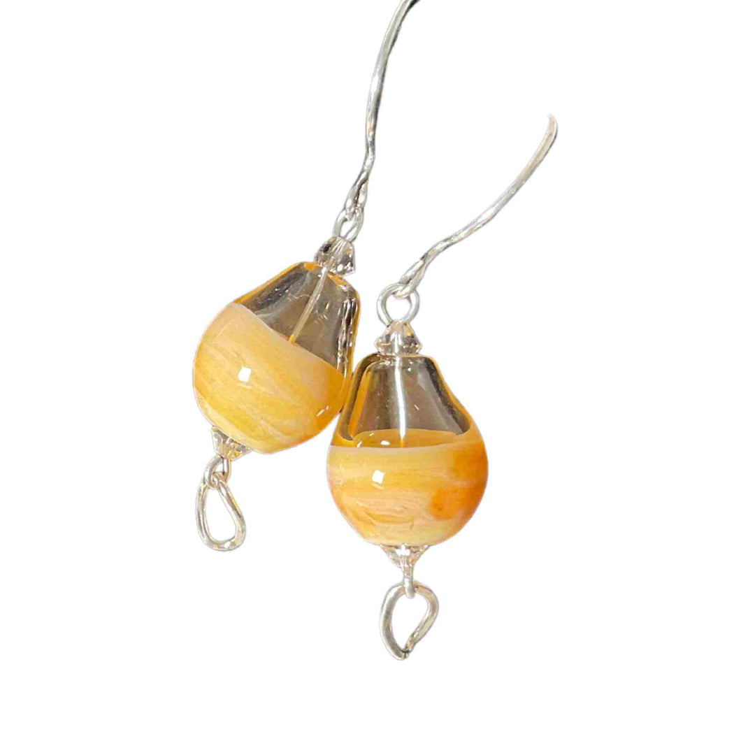 Blown glass cream earrings on French Silver.