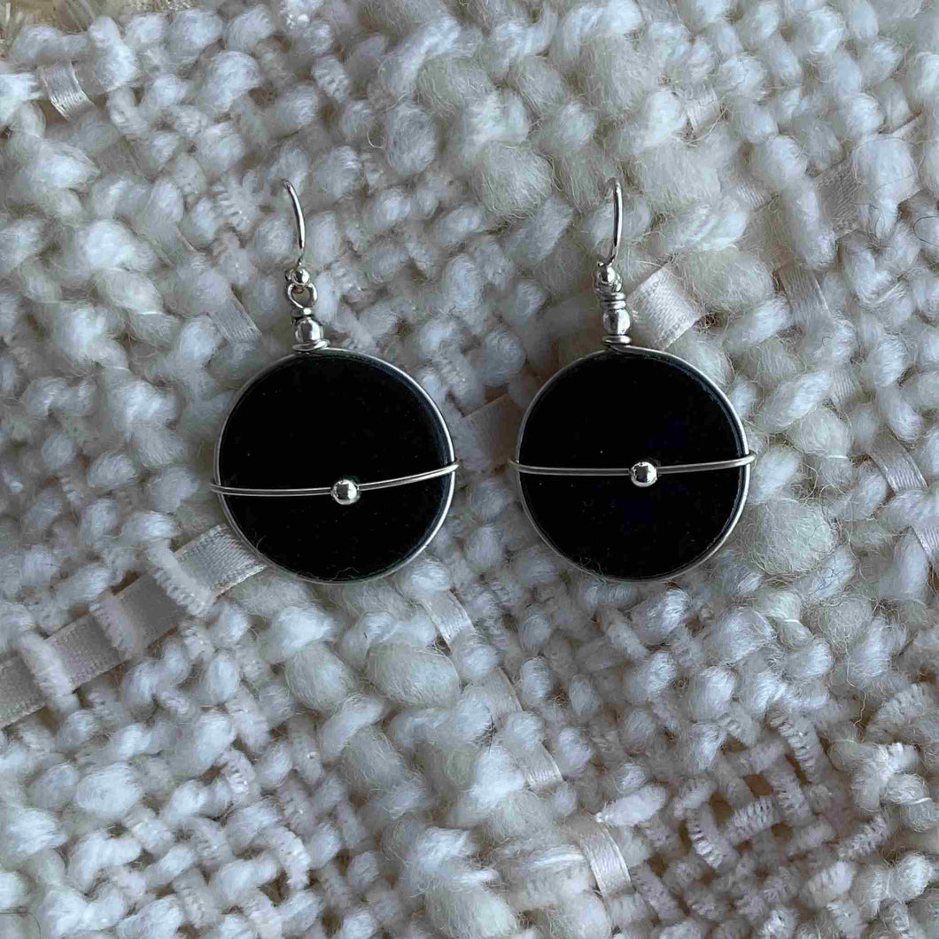 Round shape Sterling Silver earrings made from rock.